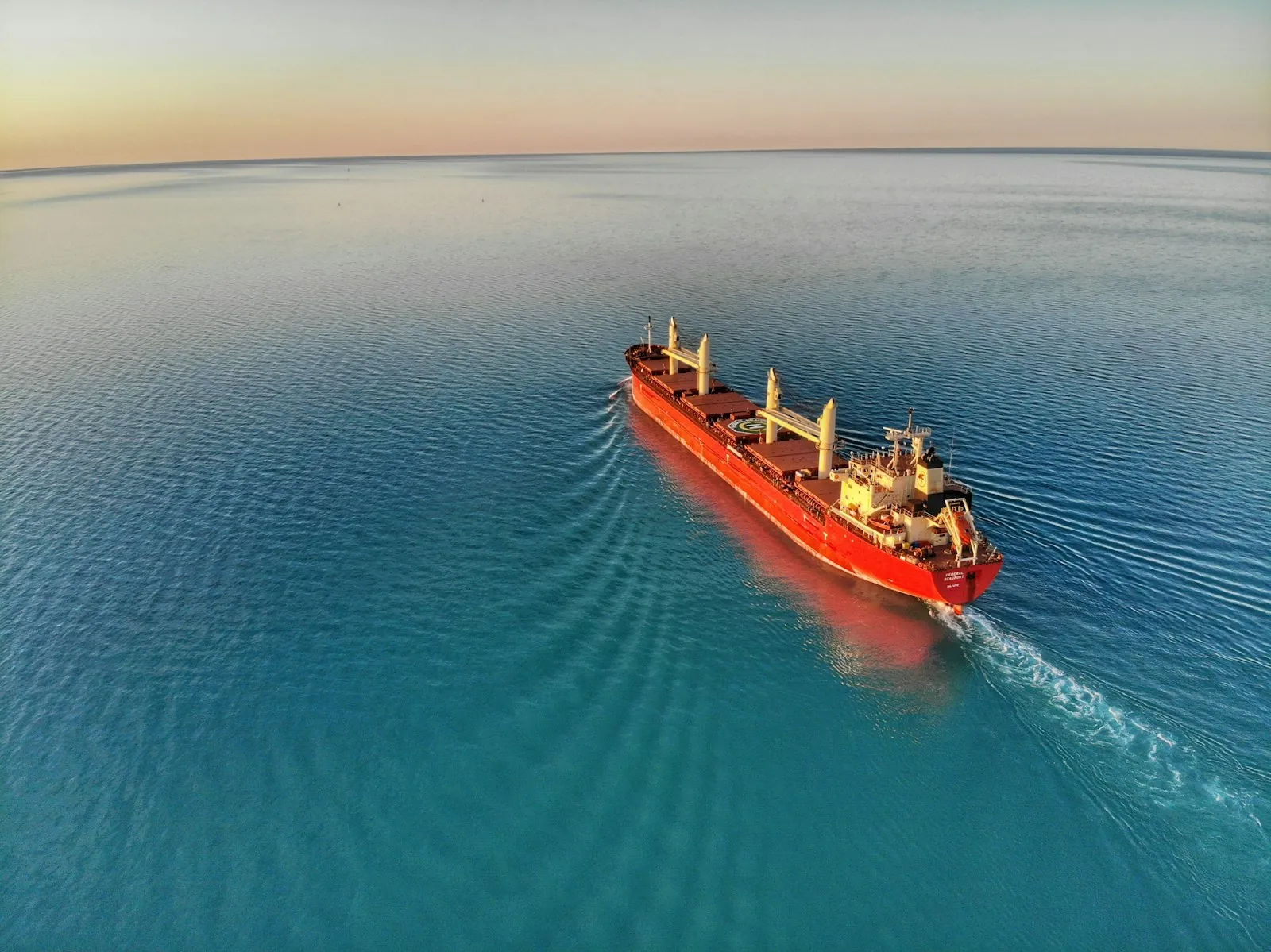 Merchant vessel alongside at port